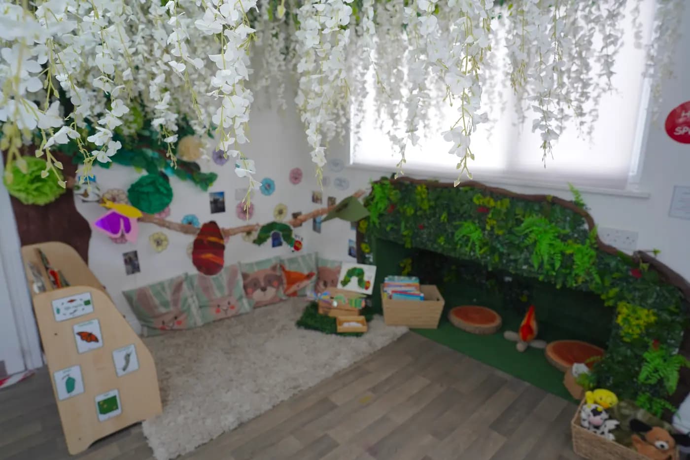 Imaginative wisteria-and-foliage reading nook at Blue Nest Borehamwood