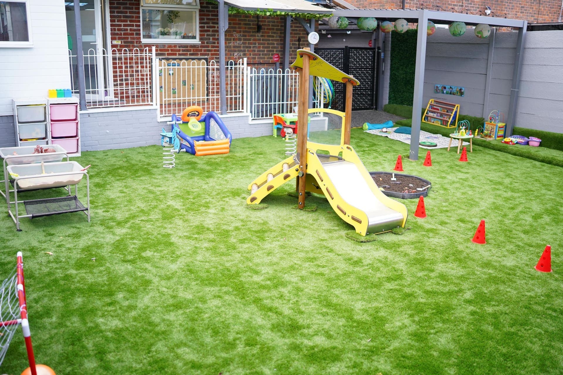 Children learning outdoors at Blue Nest Forest School
